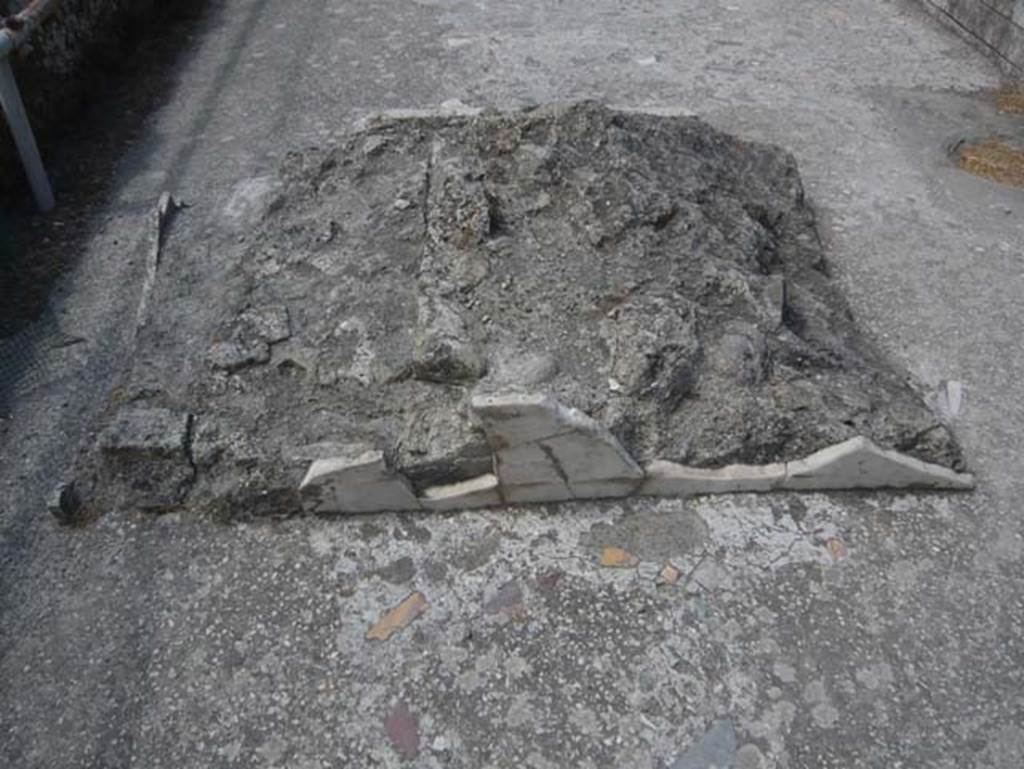 Herculaneum, August 2013. Sacred Area terrace, remains of a marble-clad altar, looking west. Photo courtesy of Buzz Ferebee.